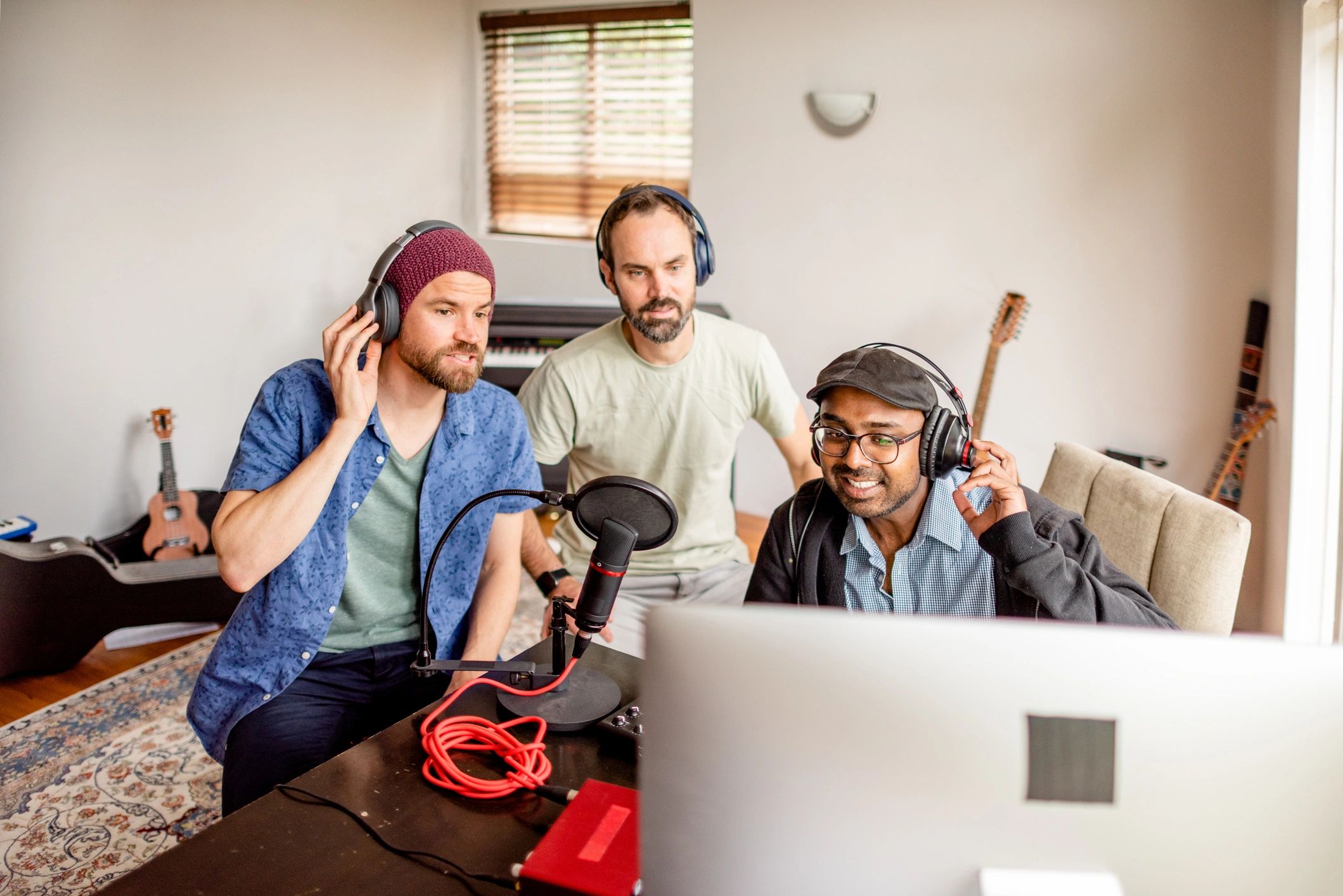 sports podcast team recording